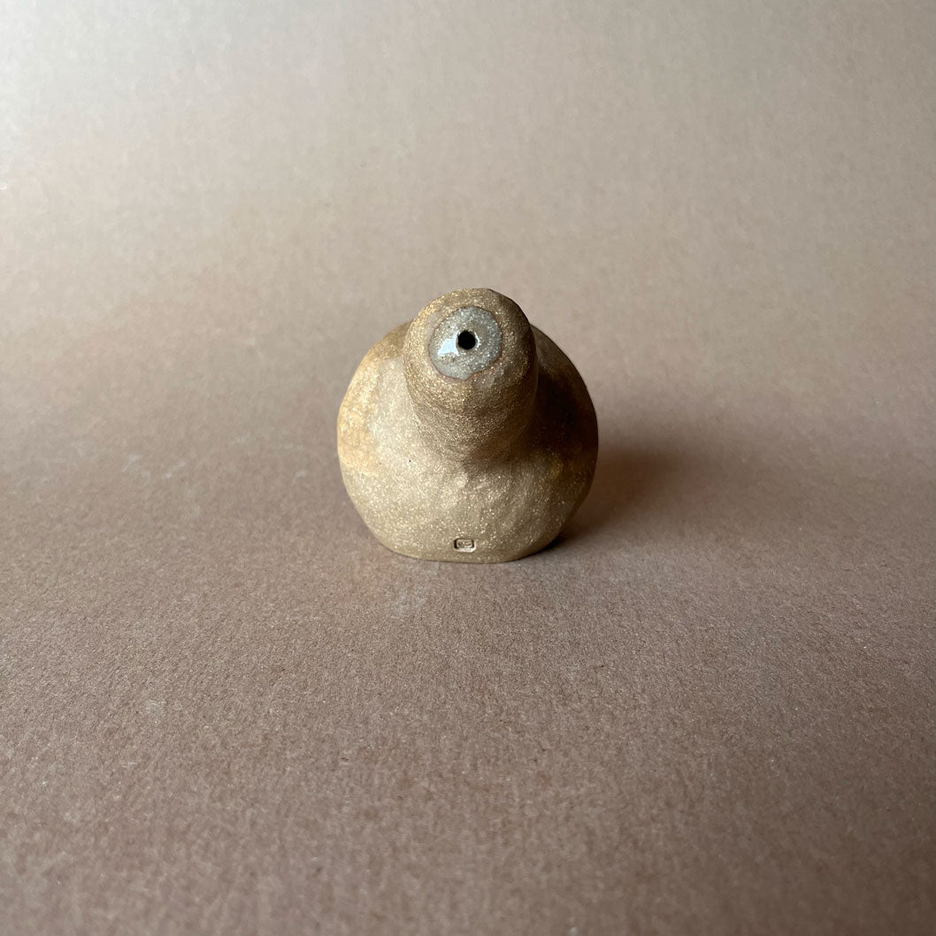A gourd shaped, spherical body form in brown stoneware with hammered texture, featuring a large glazed inset bowl and rounded stem protrusion mouthpiece.