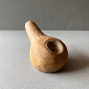 A gourd shaped, spherical body form in brown stoneware with hammered texture, featuring a large glazed inset bowl and rounded stem protrusion mouthpiece.