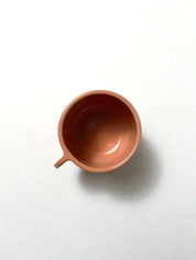 Taza de espresso fruncida
