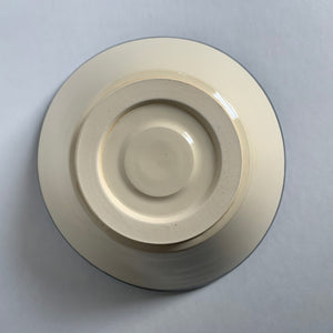 Black and white angled bowl, bottom view